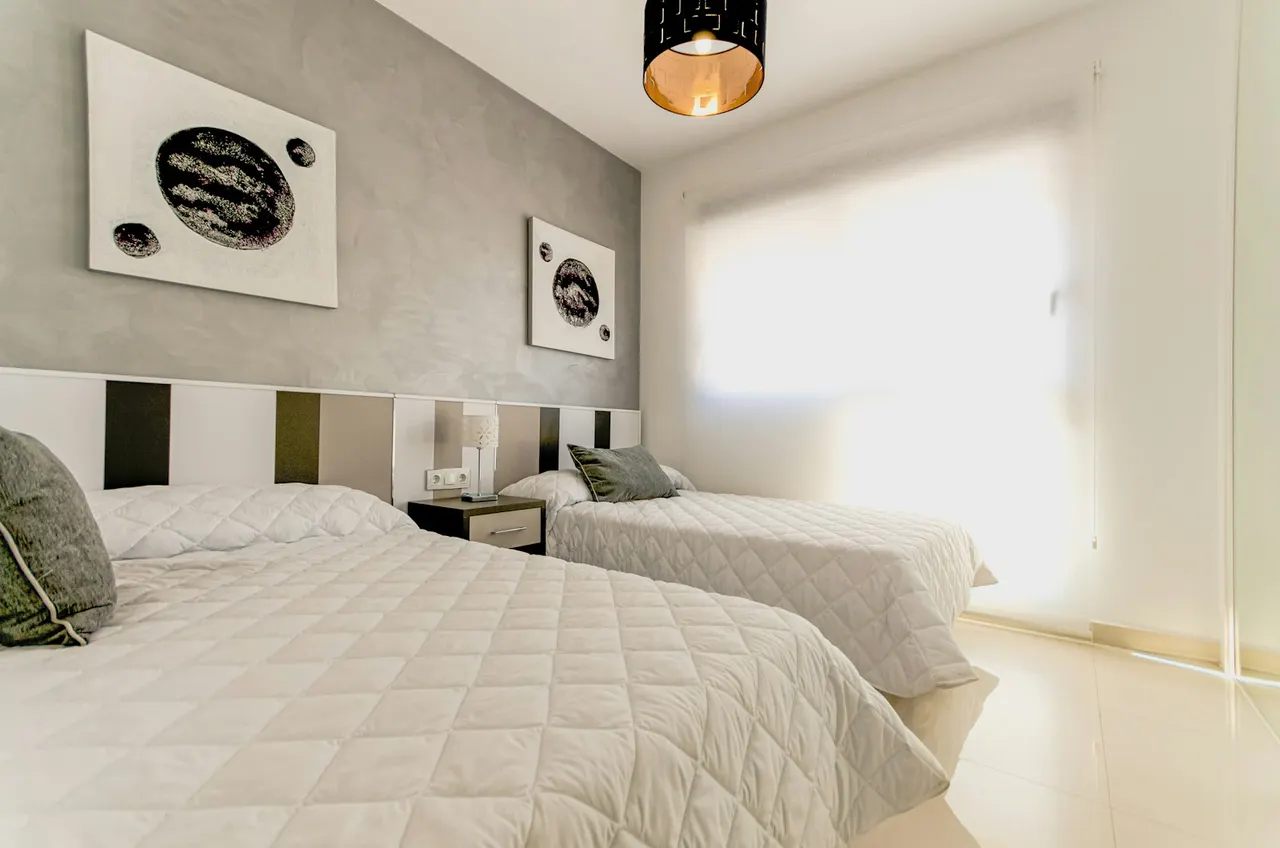 Luxury villa bedroom with revenue management analytics